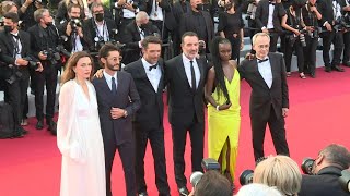 Cannes: "From Africa with Love" film crew on red carpet for closing ceremony | AFP