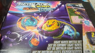 BLACKLIGHT TECH!? NEW BEYBLADE BURST QUADSTRIKE LIGHT IGNITE BATTLE SET UNBOXING!