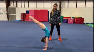 HANDSTAND BRIDGE KICKOVER