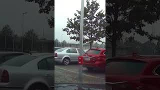 Woman Drives Directly Into Sign in Parking Lot