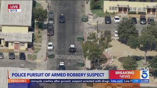 LAPD pursues fleeing armed robbery suspect in Los Angeles