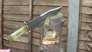 Poshland Knives Bowie heavy cutting and stabbing a solid tree stump