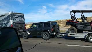 RV spotting: Passing a Newmar Ventana pulling double tow