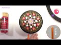 create a holiday mandala with this christmas dot art tutorial rock painting