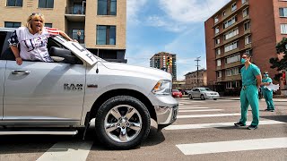 Nurse faces off anti-lockdown protesters in Colorado