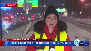 Checking current road conditions in Syracuse