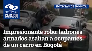 Impresionante robo: ladrones armados asaltan a ocupantes de un carro en Bogotá