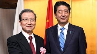 Japanese Prime Minister Shinzo Abe attends reception celebrating China's National Day