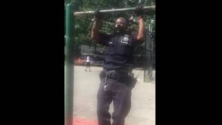 Police Officer Participates In "Pull-up Park Jam" In Uniform