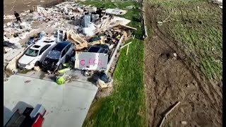 Residents begin to clean up the damage after tornadoes bear down on Nebraska, Iowa