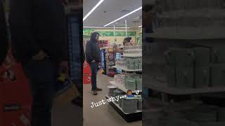 black and white fighting at the Dollar Tree