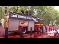 climate activists lose control of fire hose while spraying fake blood on uk treasury