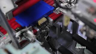 Enveloping machine for lithium prismatic batteries