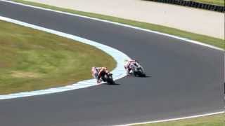 Stoner slides rear wheel at 260km to set up T4 pass on M. Pirro