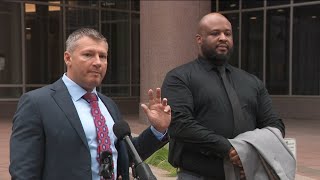 ICE agent accused of pointing his gun at commuters makes first court appearance