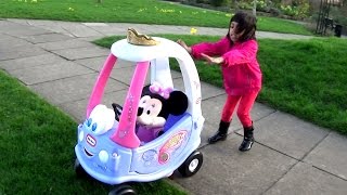 Little Girl Takes Minnie for a Ride in Pink Cozy Coupe in the Park | Ride on Fun