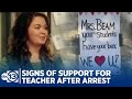 Signs of support left on Cy-Fair ISD teacher's home after arrest