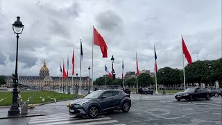 Chinese national flags fly over Paris' streets to greet President Xi