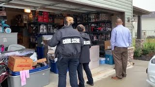 Law enforcement raids a Murfreesboro house