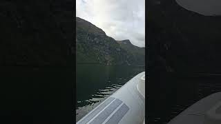 RIB boat tour in Geirangerfjord, approaching 7 Sisters and Bridal Viel waterfalls, August 2024