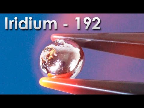 What era was a layer of iridium deposited all over Earth?