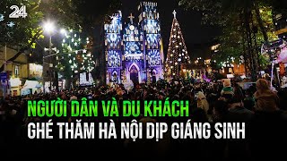 Người dân và du khách ghé thăm Hà Nội dịp Giáng sinh | VTV24