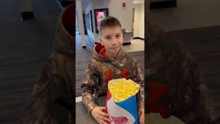 Boy Teaches Mom a Life Hack for Putting Butter in Popcorn