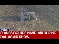 Historic military planes collide in mid-air crash at Dallas Executive Airport