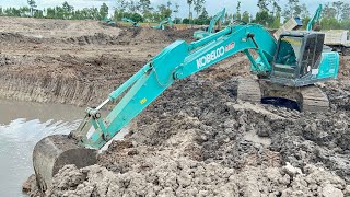 KOBELCO Sk200-10 พาทิศคอนสทรัคชั่นตักดินโคลนใส่ดั้ม10ล้อ ลำบากสุดๆครับหน้างานแบบนี้