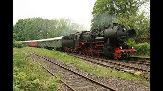 German Steam locomotive 52-8038 and steam train are passing Nienstädt station. DDE022505