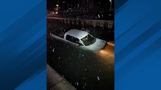 Police chase ends with truck submerged in West Grand Traverse Bay, two men arrested