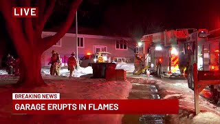 Crews battle garage fire at Bellevue home