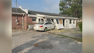 Car rams into Smithfield building