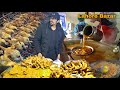 LAHORI STREET FOOD IN PAKISTAN - Motay Ke Channy, Khalifa Sajji & Deep Fried Chicken