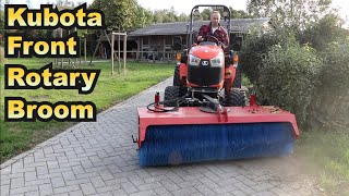 Kubota B2261 with Mulder M-Sweep Rotary Broom on Front Hitch with hydraulic yaw angle adjustment