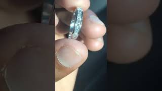 Princess cut diamonds on a 18k white gold band