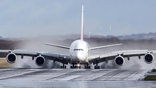 AIRBUS A380 LANDING with an AIRBUS A319 DEPARTING AHEAD - A380 on a wet runway (4K)