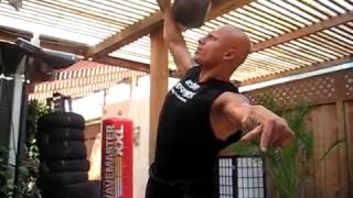 Sifu Harinder Pressing an 88lb Kettlebell