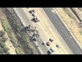 Large sinkhole shuts down California freeway