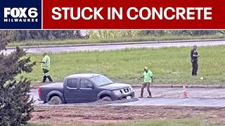 WI driver removes ‘road closed’ barrier; stuck in fresh concrete | FOX6 News Milwaukee