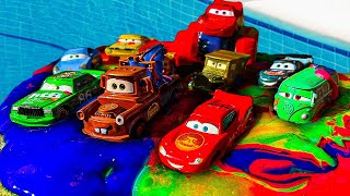 Disney Pixar Cars fall into the water: Lightning McQueen, Chick Hicks, Jackson S