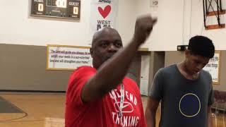 Michael ‘Pops’ Sims provides instruction during basketball academy