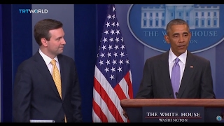 President Obama catches spokesman Josh Earnest off-guard