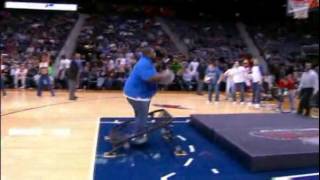 Fat guy trying to dunk off a trampoline at the Hawks game = awesome