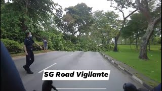 12jun2021 changi coast road to xilin ave road blocked by fallen tree cyclist warn commuters