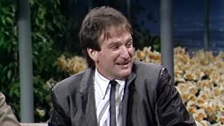 Robin Williams on Carson w/ flowers 1984