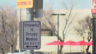 Are Albuquerque police officers writing citations for people standing on medians?