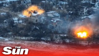 Ukrainian forces blast Russian buildings with Rapira MT-12 anti-tank guns