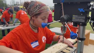 Tampa Bay Sun FC players trade cleats for tool belts to build beds for children in need