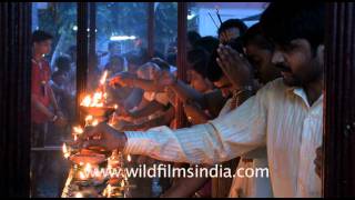 Devotees lighting lamps in Kamakhya temple